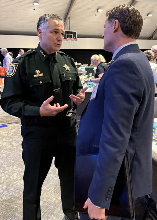 Ryan Elijah with a Central Florida sheriff's deputy